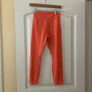 Zyia peach colored leggings